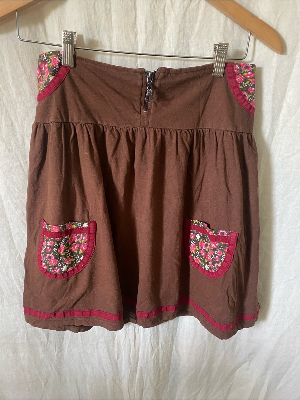 Brown Mini Skirt with Pink Floral Patch Pocket Details, Red Trim, and Zipper